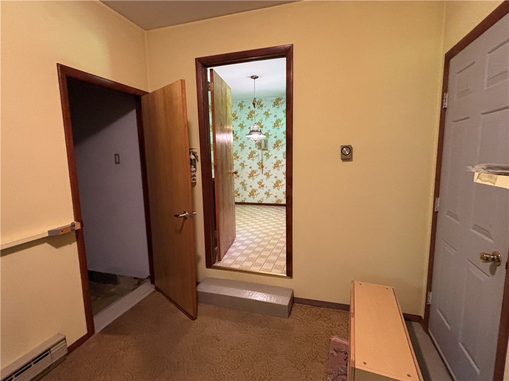 125 Maple Valley Road Worcester, NY 12197 - Photo 19 of 35 Mudroom entrance from garage leading to basement, kitchen and back yard.