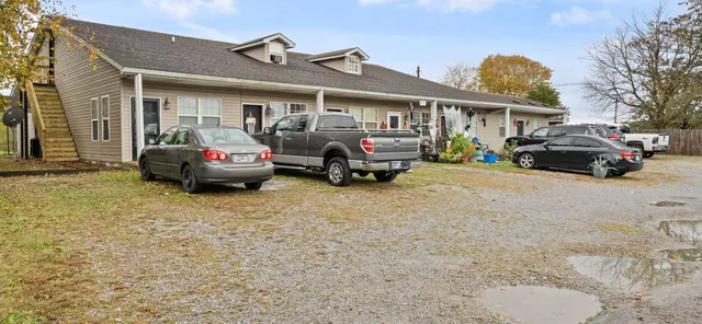 a car parked in front of a house