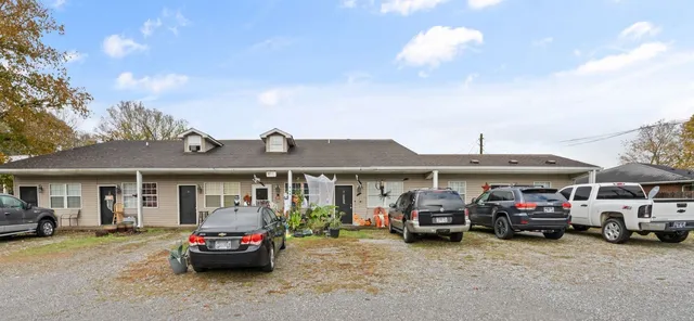 a car parked in front of a house