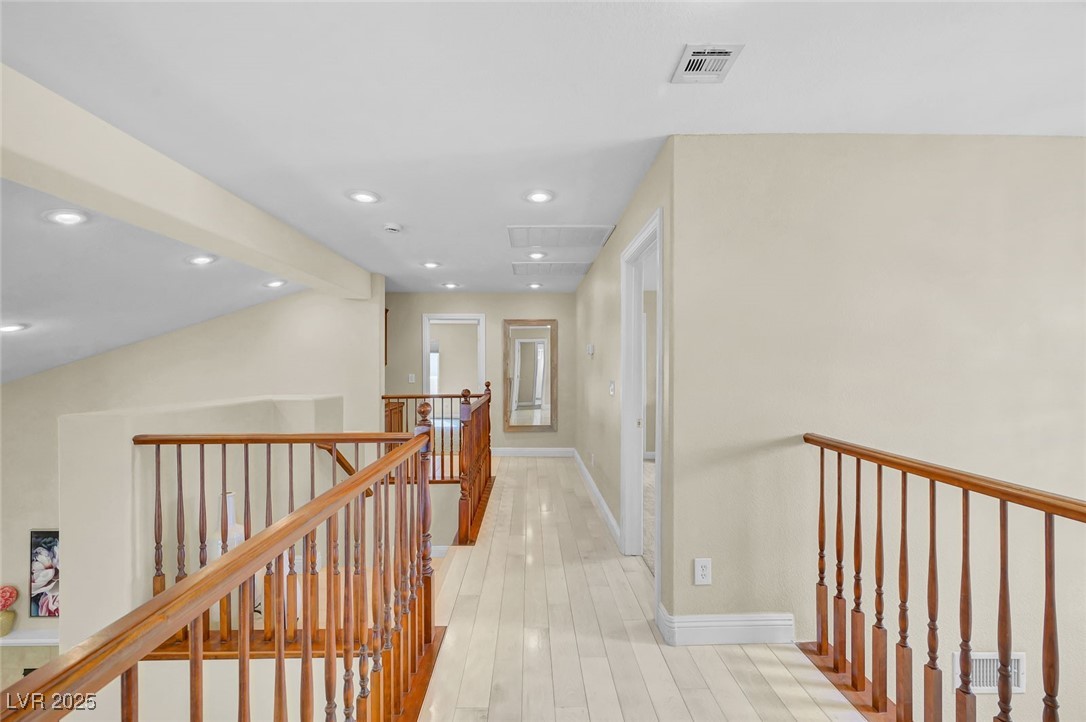 9725 Sandy Turtle Avenue Las Vegas, NV 89149 - Photo 36 of 51 Corridor featuring an upstairs landing, recessed lighting, and light wood-style floors
