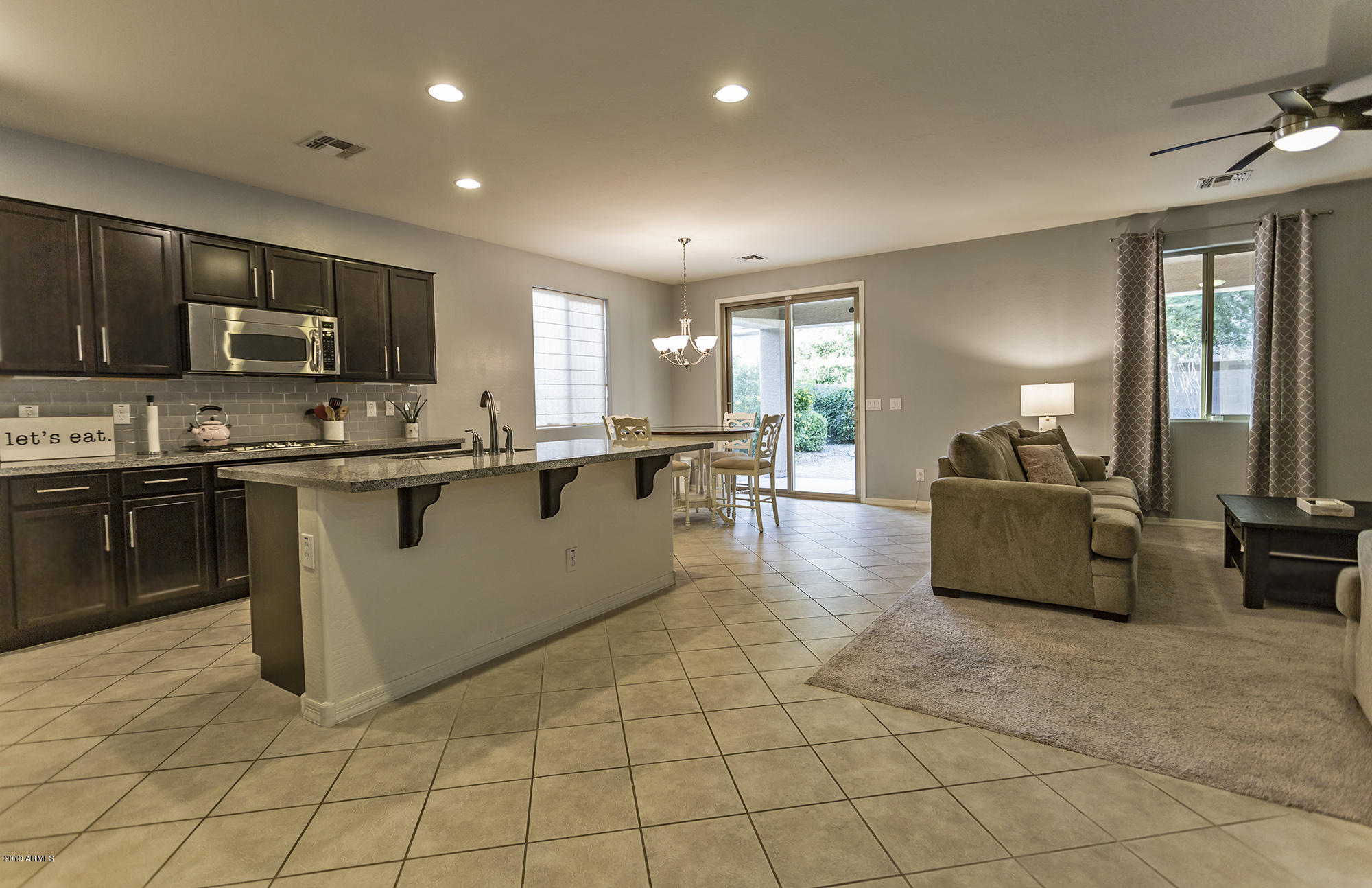 16128 West Almeria Road Goodyear, AZ 85395 - Photo 4 of 26 0T7A0179