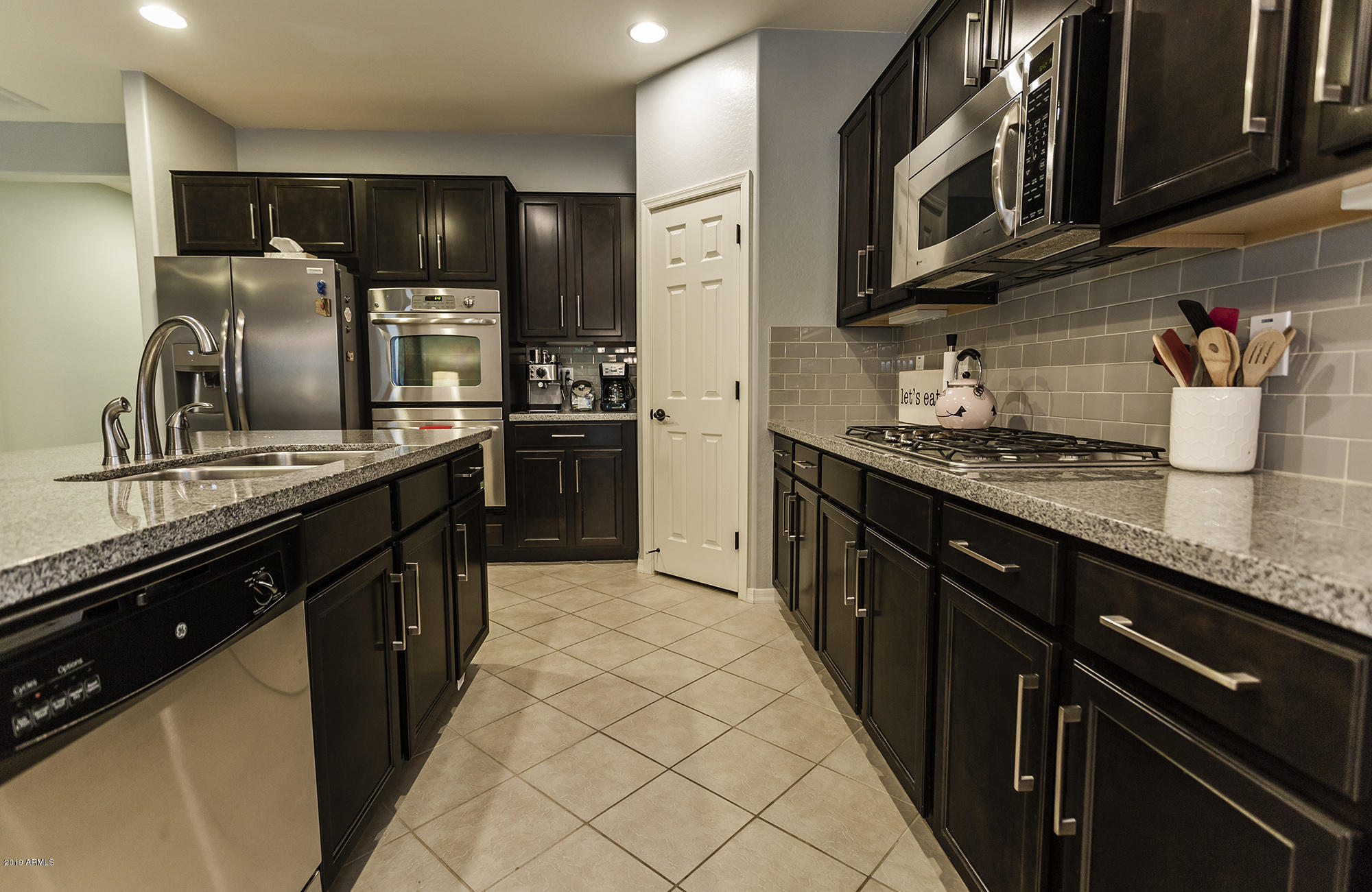 16128 West Almeria Road Goodyear, AZ 85395 - Photo 5 of 26 0T7A0209