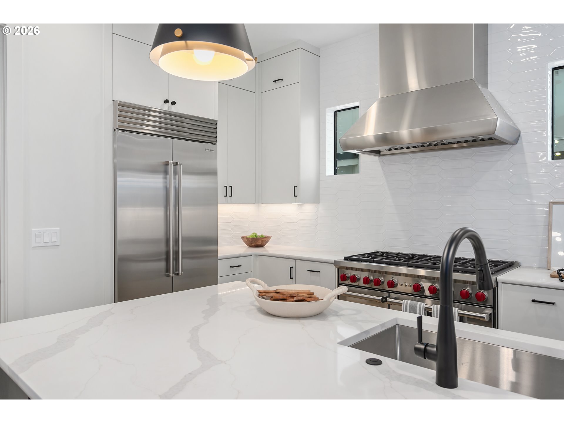 4977 Summit Street West Linn, OR 97068 - Photo 8 of 43 a kitchen with a stove a refrigerator and a sink
