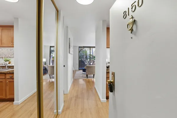 a view of a bathroom from the hallway