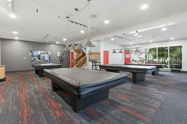 a view of balcony with wooden floor and fence