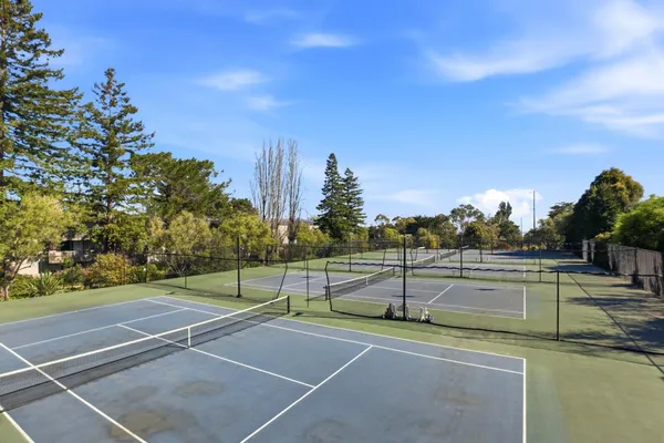 a view of a house with sitting area and furniture