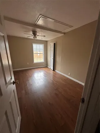a view of an empty room and window
