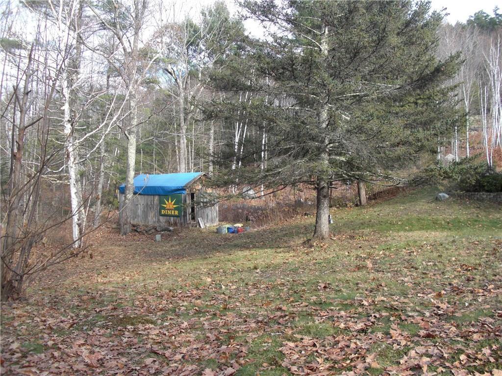 263 Porterfield Road Porter, ME 04068 - Photo 28 of 31 Lower yard with storage shed. Tarp...