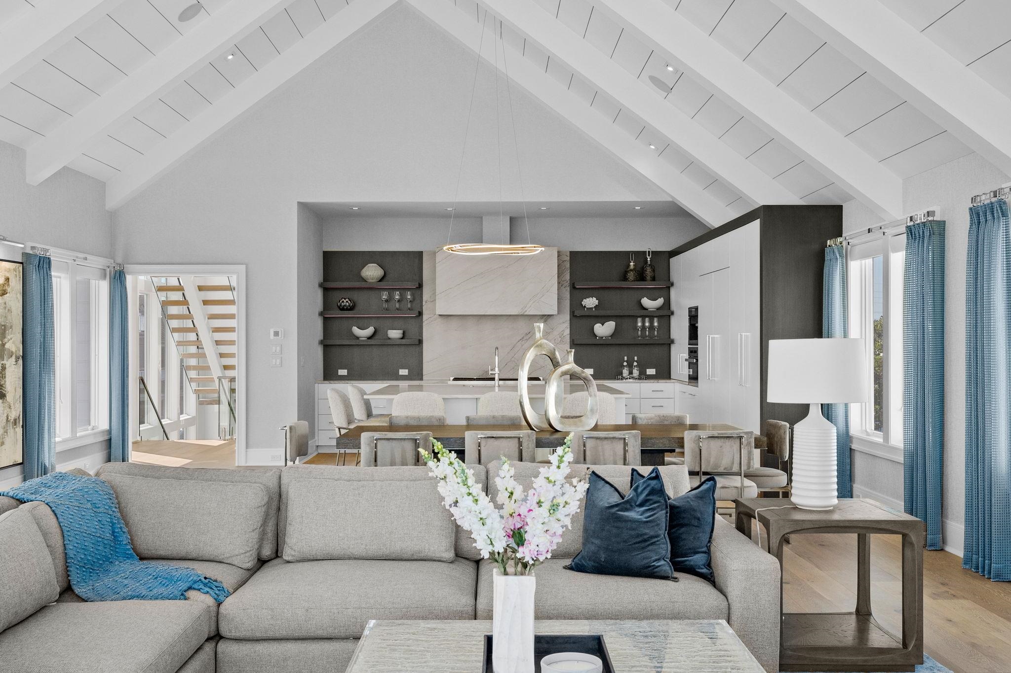 8808 1st Avenue Stone Harbor, NJ 08247 - Photo 12 of 49 a living room with furniture and large windows