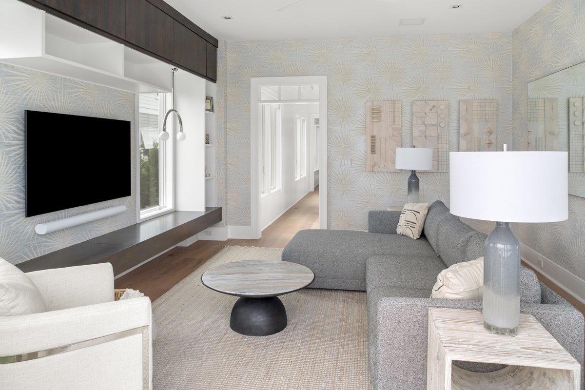 8808 1st Avenue Stone Harbor, NJ 08247 - Photo 15 of 49 a living room with furniture and a flat screen tv