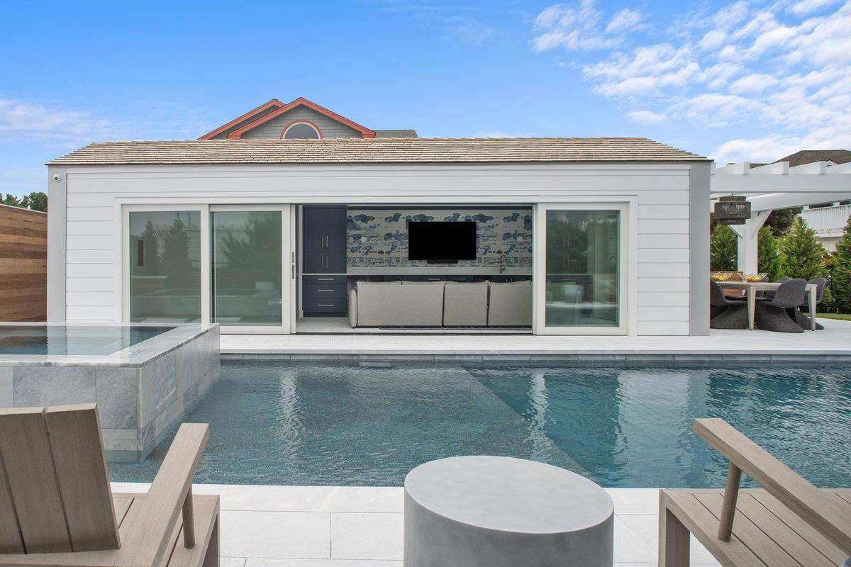 8808 1st Avenue Stone Harbor, NJ 08247 - Photo 19 of 49 a view of a house with a porch
