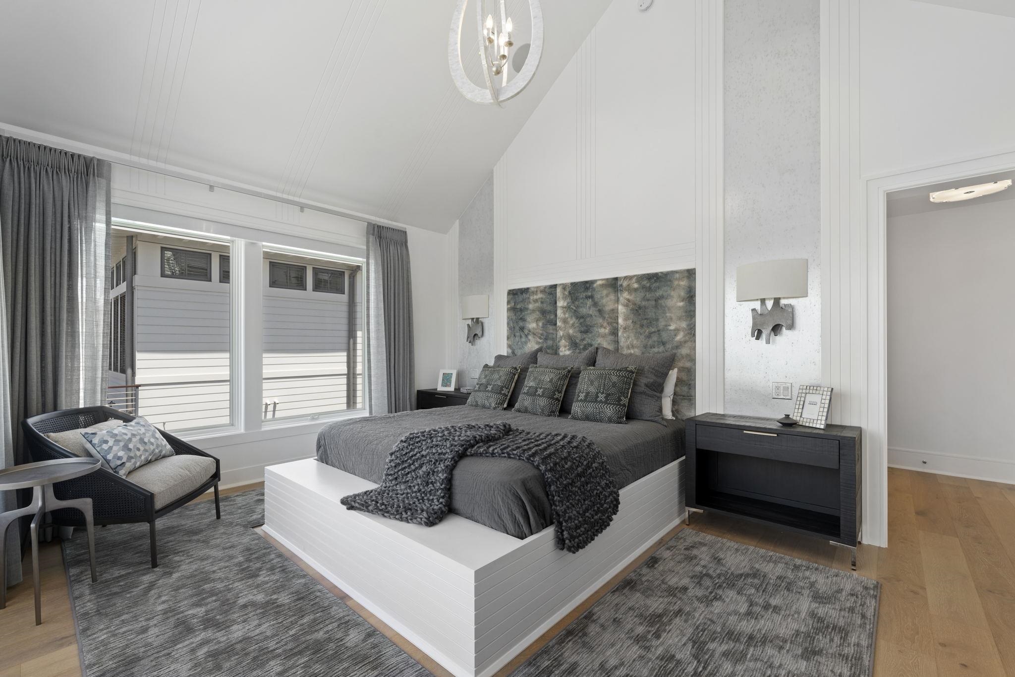 8808 1st Avenue Stone Harbor, NJ 08247 - Photo 22 of 49 a bedroom with a bed and a couch