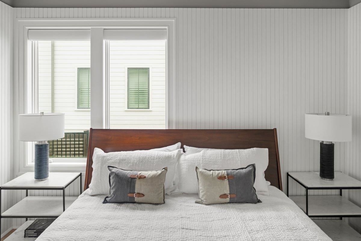 8808 1st Avenue Stone Harbor, NJ 08247 - Photo 30 of 49 a spacious bedroom with a couch and windows