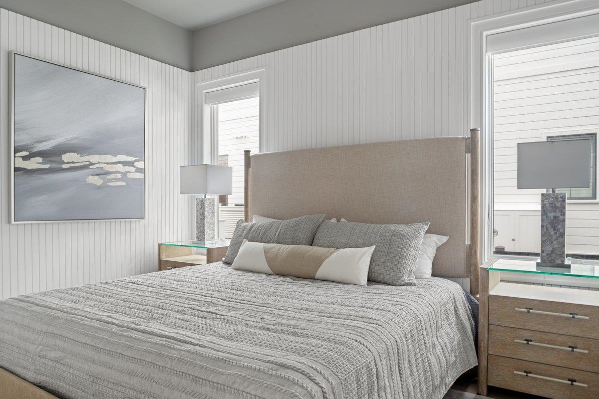 8808 1st Avenue Stone Harbor, NJ 08247 - Photo 32 of 49 a bedroom with a bed and a window