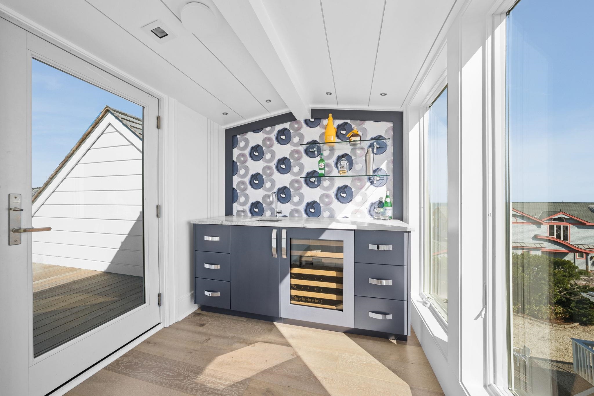 8808 1st Avenue Stone Harbor, NJ 08247 - Photo 38 of 49 a view of an entryway with wooden floor