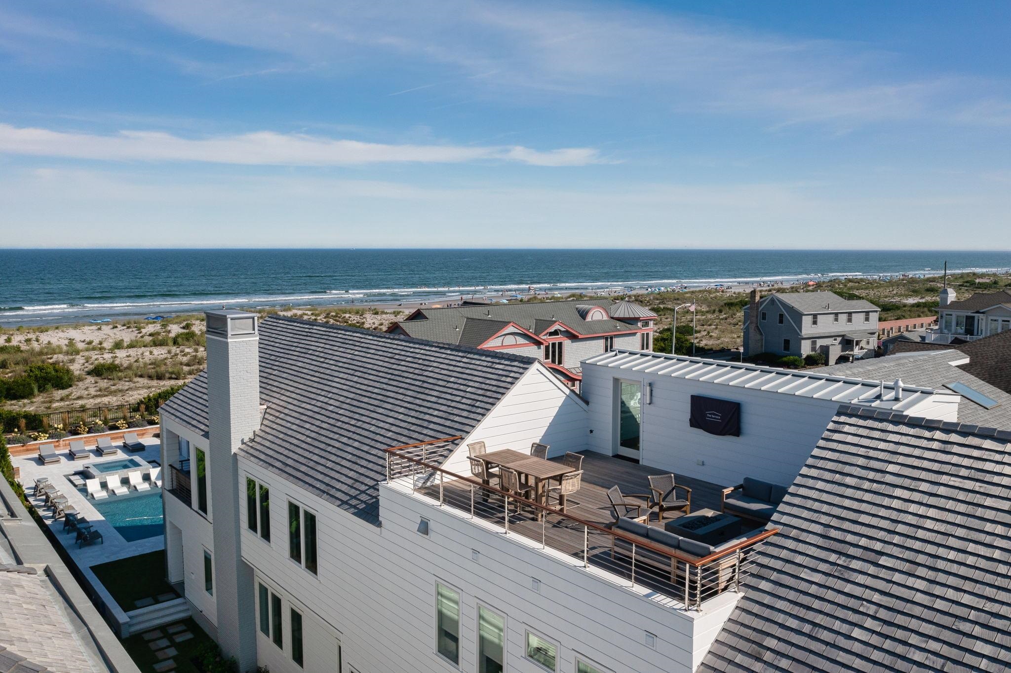 8808 1st Avenue Stone Harbor, NJ 08247 - Photo 39 of 49 a view of roof with city view