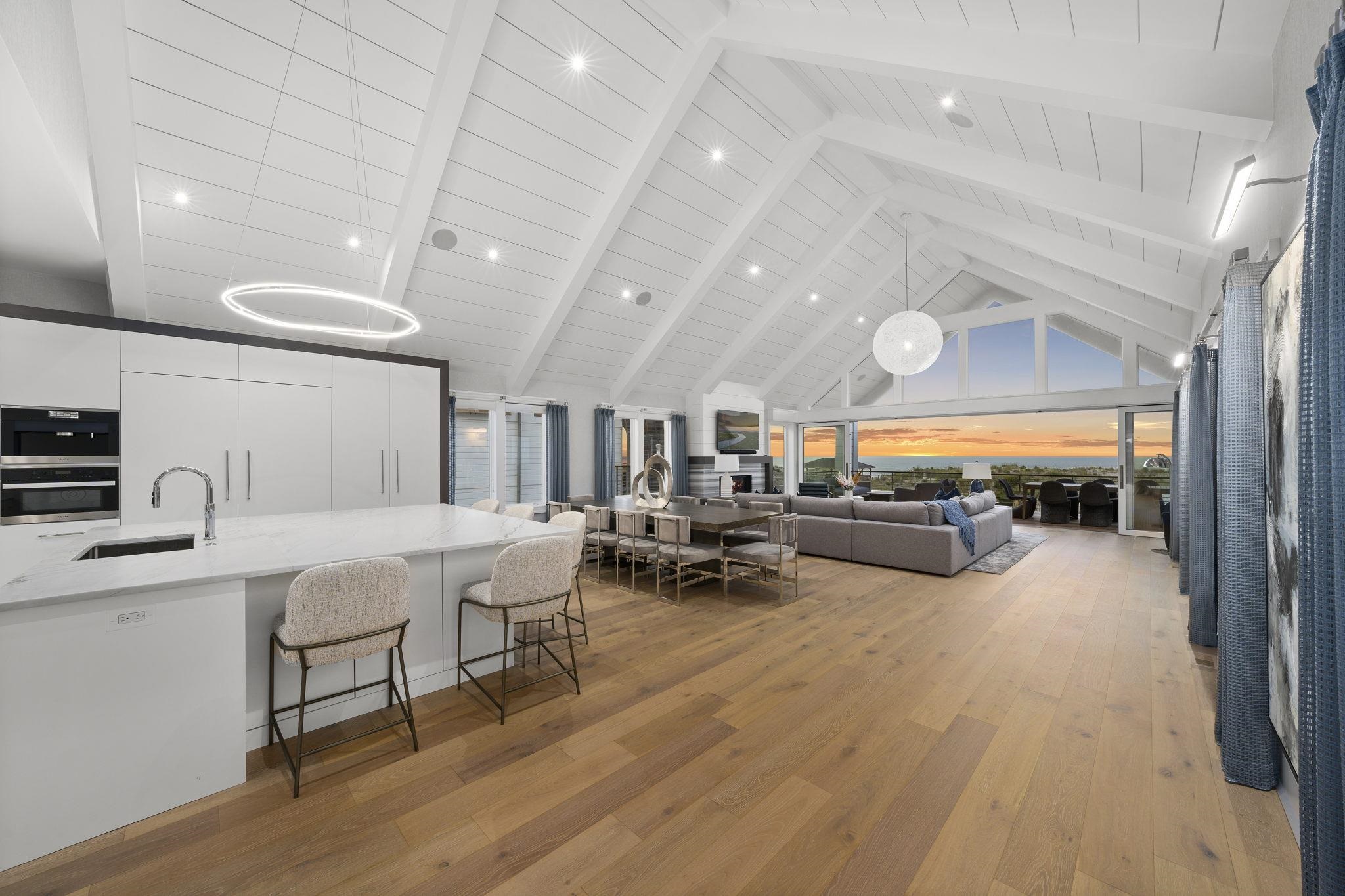 8808 1st Avenue Stone Harbor, NJ 08247 - Photo 47 of 49 a living room with furniture and a flat screen tv