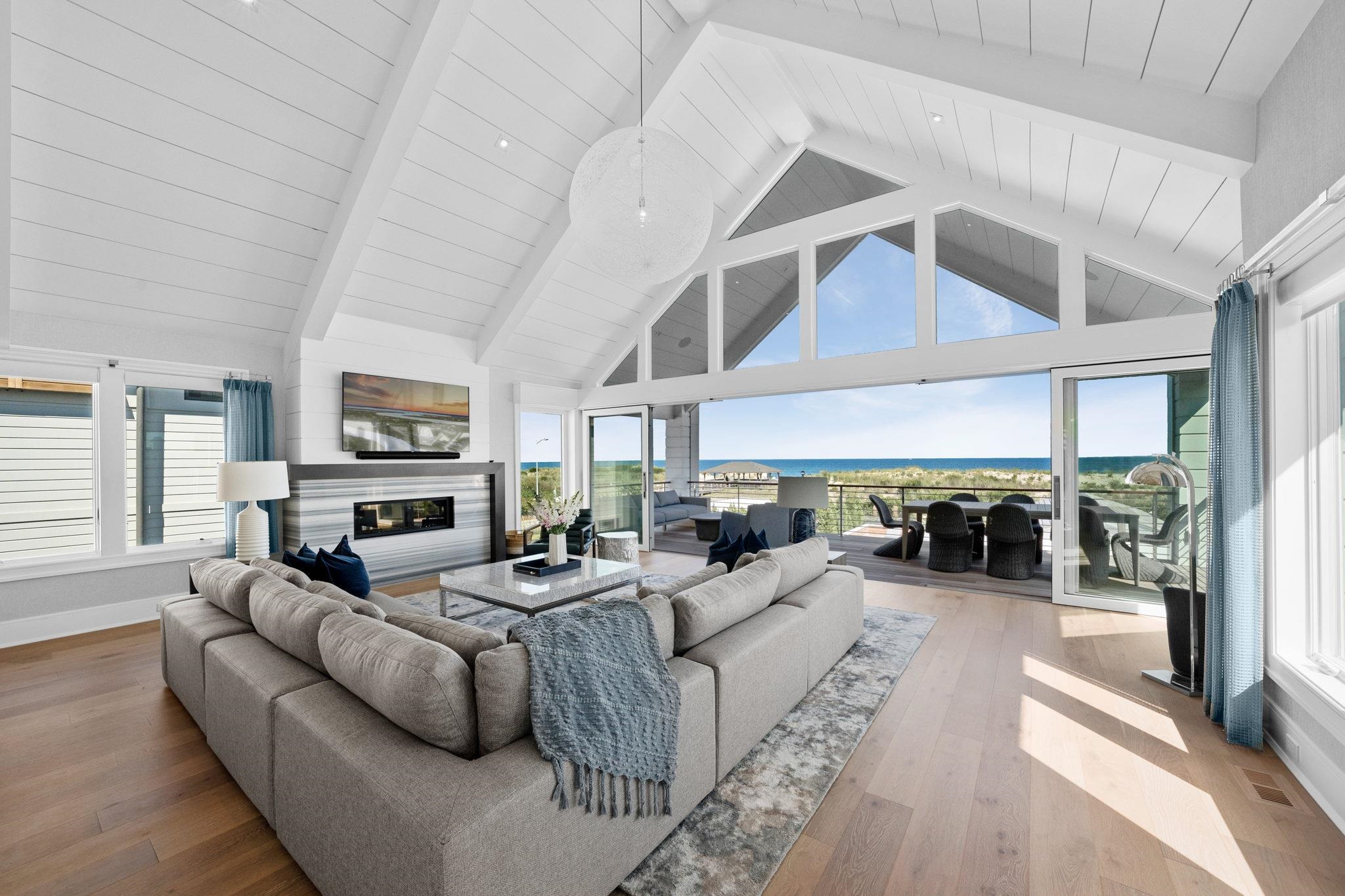 8808 1st Avenue Stone Harbor, NJ 08247 - Photo 6 of 49 a living room with furniture and a fireplace