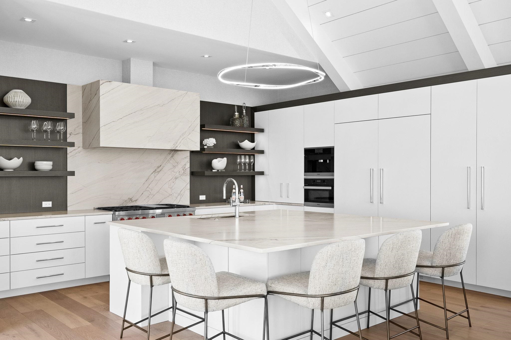 8808 1st Avenue Stone Harbor, NJ 08247 - Photo 9 of 49 a kitchen with stainless steel appliances granite countertop a stove a sink and a refrigerator