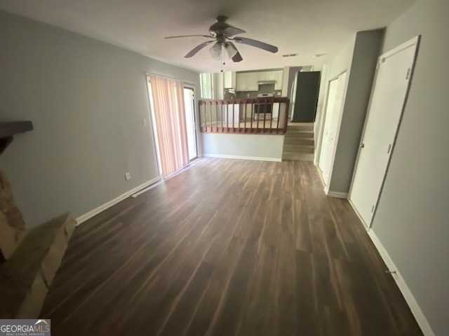 5389 Martins Crossing Road Stone Mountain, GA 30088 - Photo 11 of 30 wooden floor in an empty room with a window