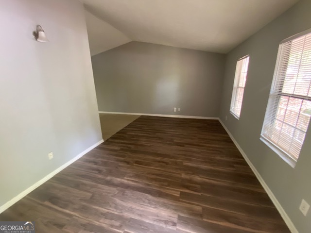 5389 Martins Crossing Road Stone Mountain, GA 30088 - Photo 3 of 30 wooden floor in an empty room with a window