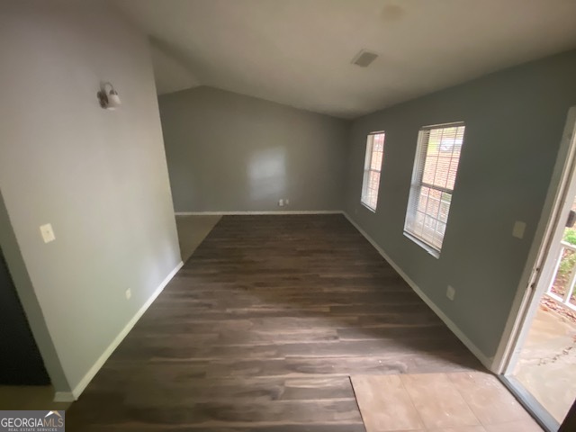 5389 Martins Crossing Road Stone Mountain, GA 30088 - Photo 4 of 30 a view of an empty room and wooden floor
