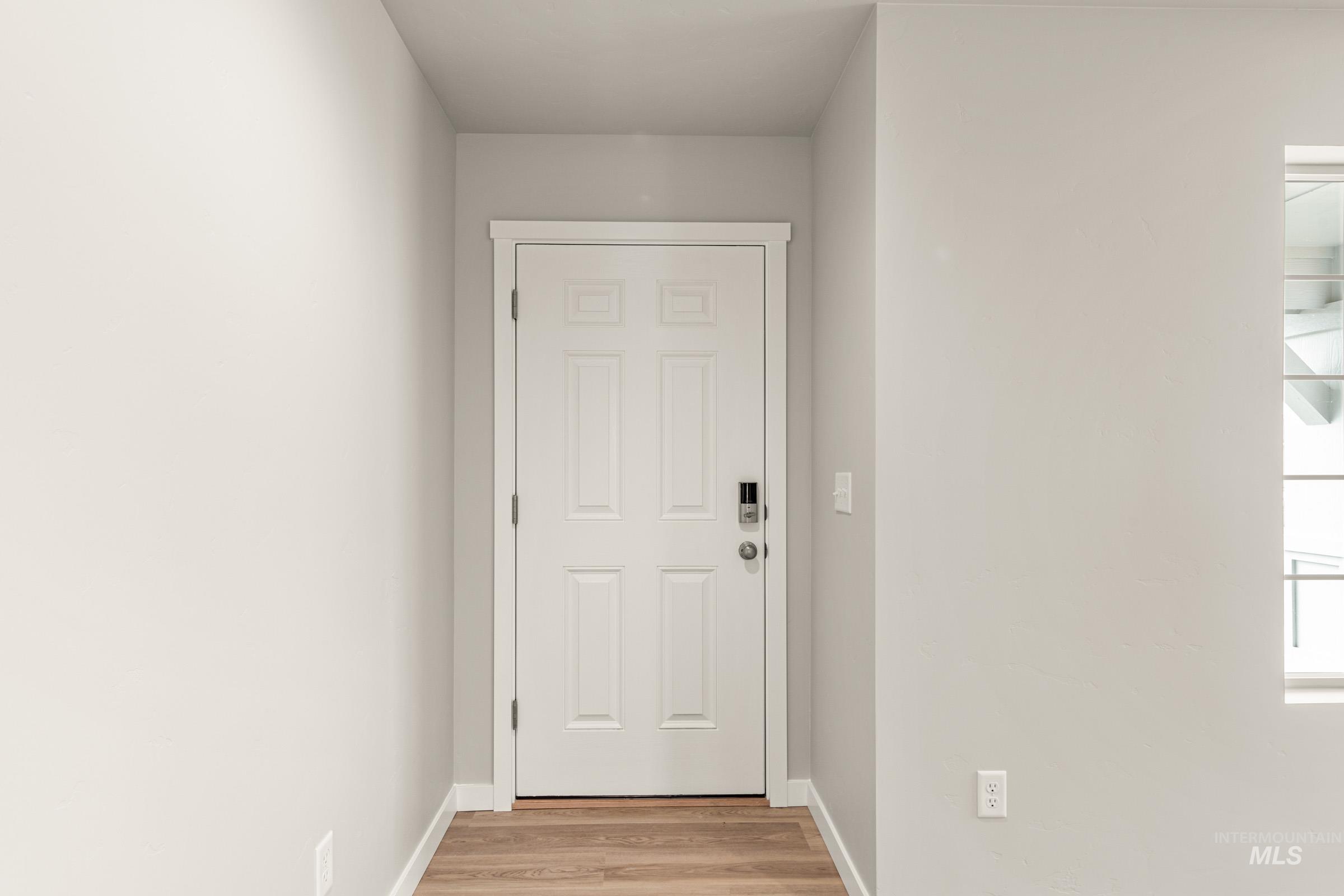 13686 Inman Court Caldwell, ID 83607 - Photo 2 of 20 Entryway featuring wood finished floors and baseboards