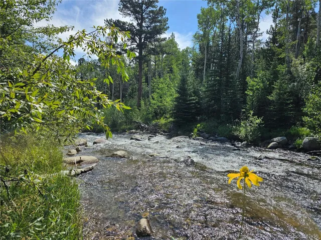 a view of an outdoor space with swimming pool