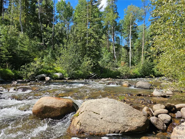 a view of a backyard of the house