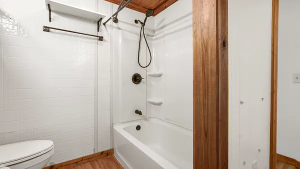 a kitchen with appliances cabinets and a sink