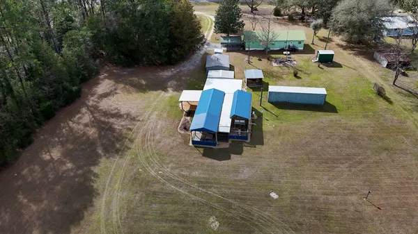 a view of swimming pool with outdoor seating