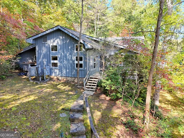 a bed room with a bed and a table