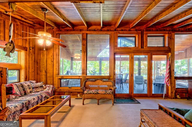 a bathroom with a sink a mirror and a shower