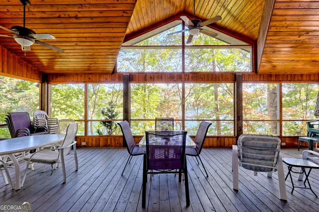 a living room with large windows