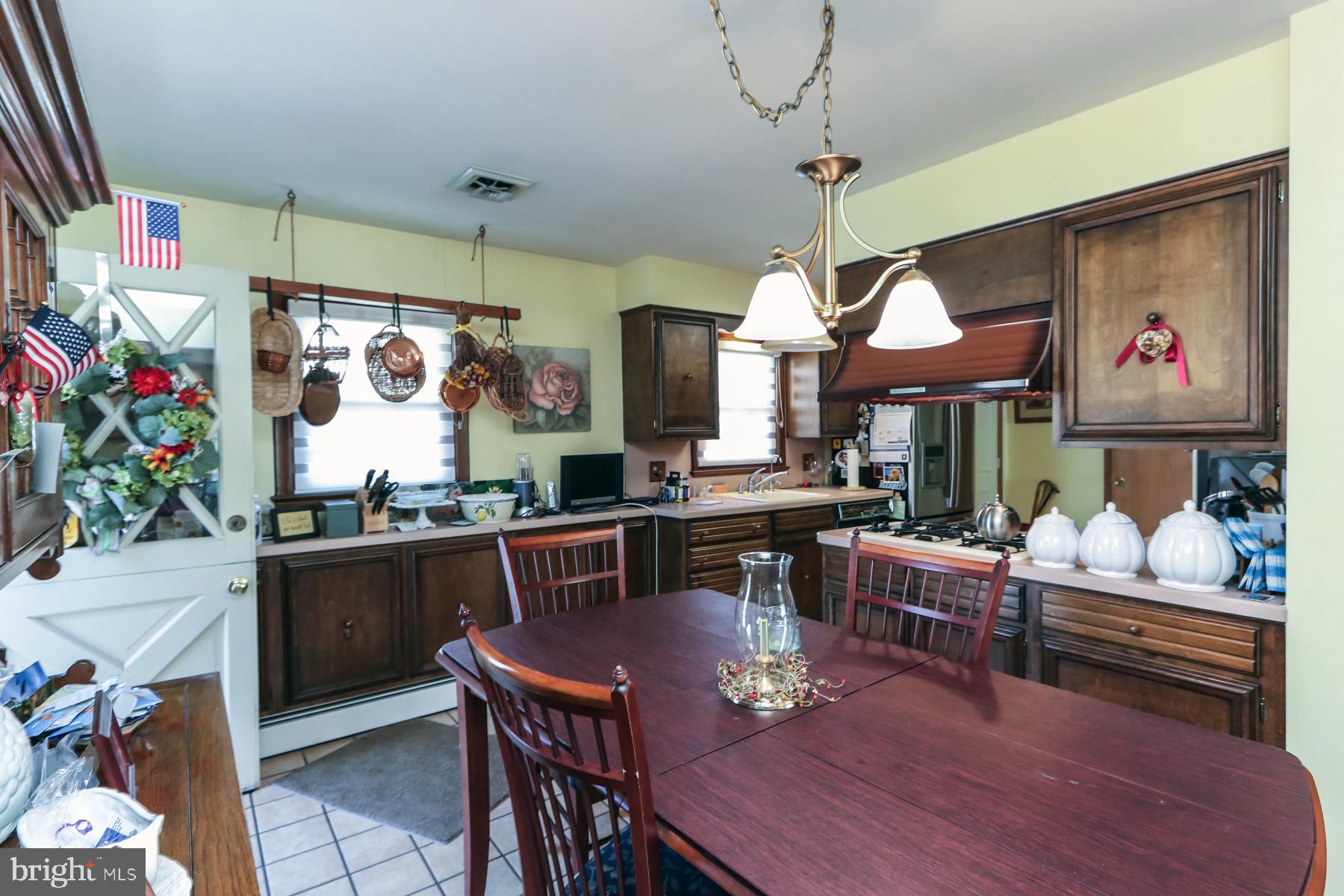 765 Magnolia Road Vineland, NJ 08360 - Photo 14 of 42 Broad view of dining area/kitchen