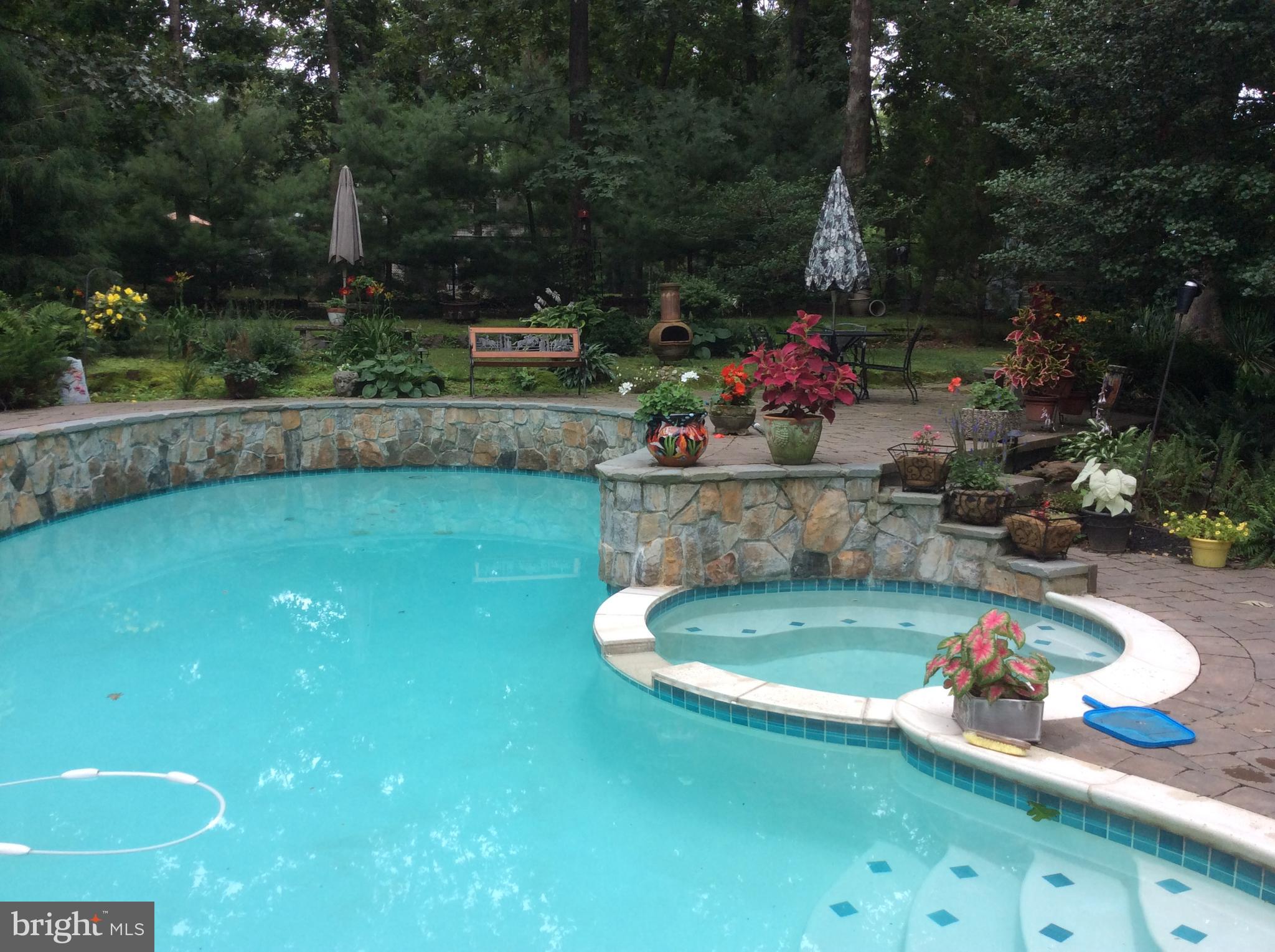 765 Magnolia Road Vineland, NJ 08360 - Photo 35 of 42 View of pool, spa and beautiful landscaping