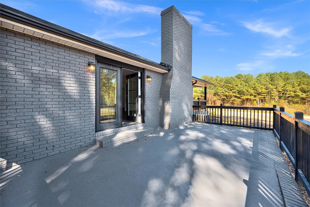 801 Cherokee Road Pelzer, SC 29669 - Photo 33 of 45 This outdoor space offers a private retreat with expansive views of the surrounding natural landscape.
