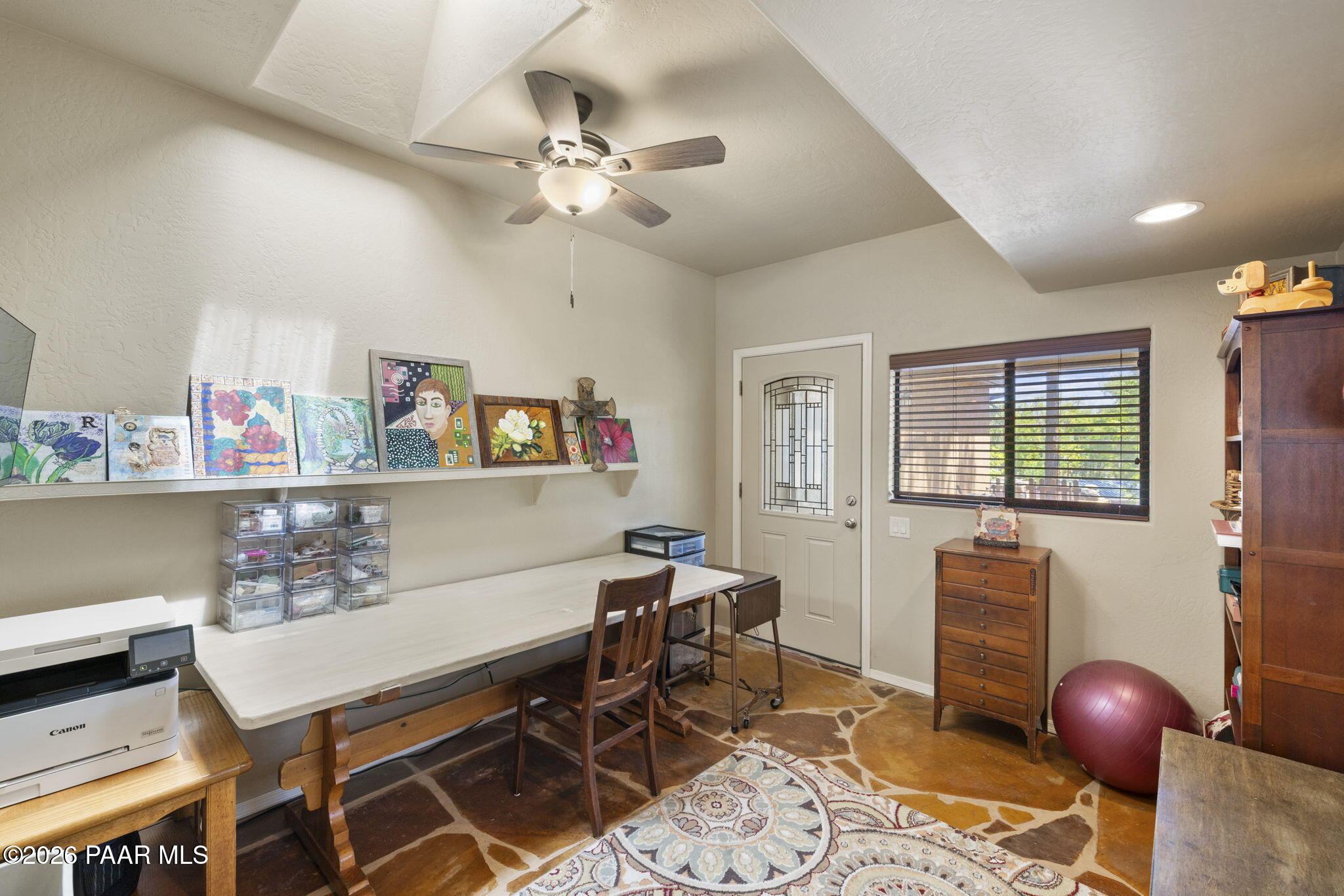 535 Copper Basin Road Prescott, AZ 86303 - Photo 31 of 41 a view of a dining room with furniture and chandelier