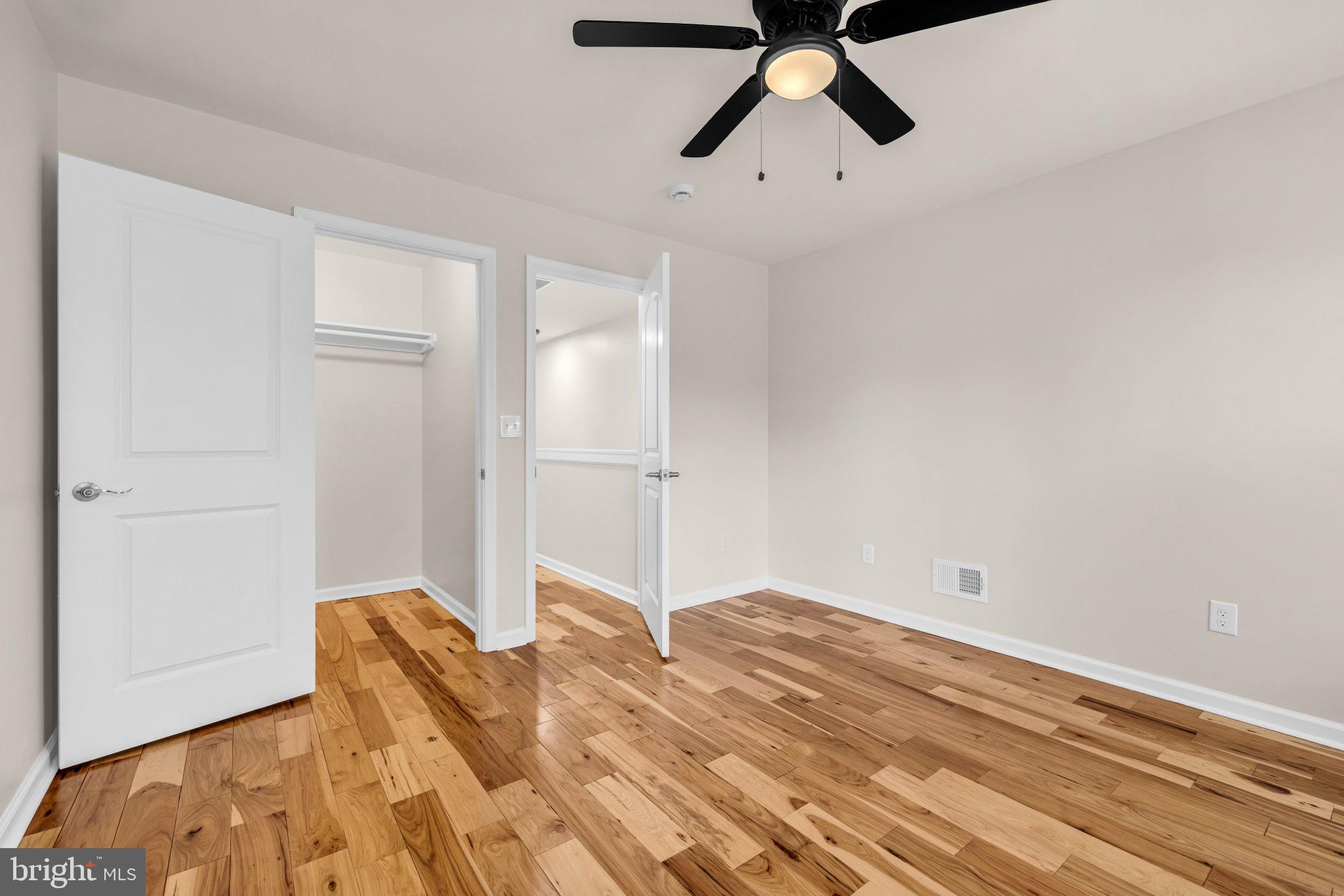 1622 Hazel Street Baltimore, MD 21226 - Photo 14 of 40 Bright and airy room with wood floors.