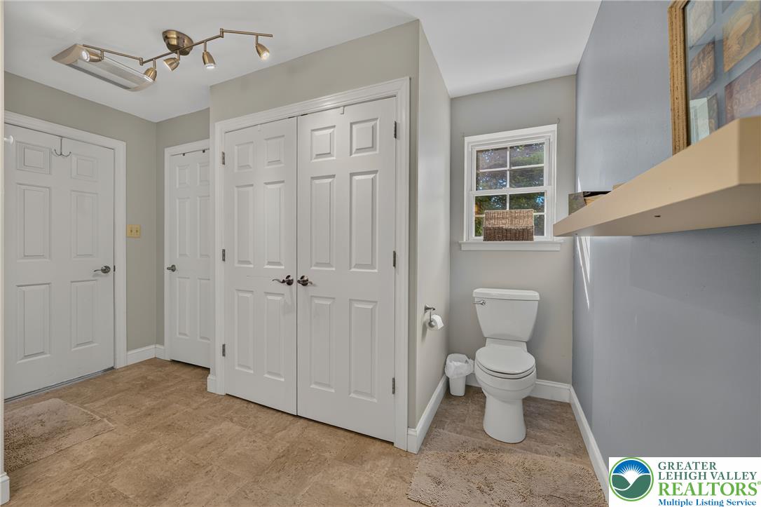1702 Red Bud Road Quakertown, PA 18951 - Photo 37 of 68 Functional bathroom with tiled flooring and a convenient window for natural light.
