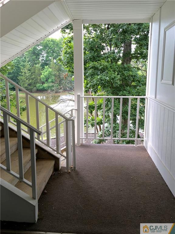 313 Wimbeldon Court North Brunswick, NJ 08902 - Photo 2 of 17 a view of an empty room with a large window