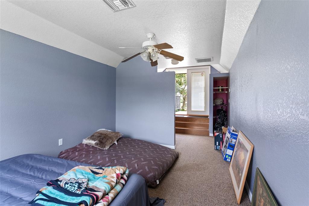 12136 McIntosh Road Thonotosassa, FL 33592 - Photo 27 of 44 a living room with furniture and a chandelier