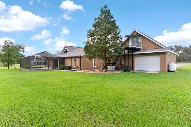 a front view of house with yard and seating area