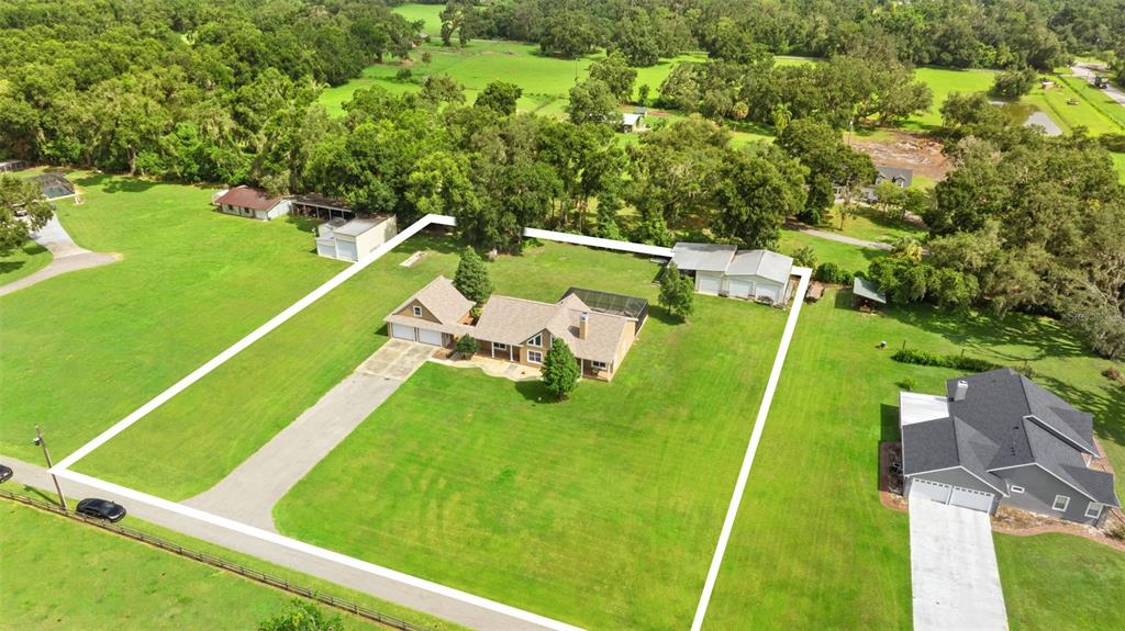 12136 McIntosh Road Thonotosassa, FL 33592 - Photo 5 of 44 a view of a tennis court