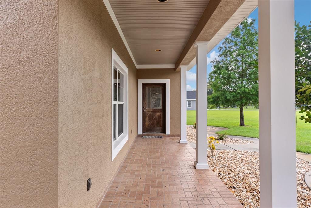 12136 McIntosh Road Thonotosassa, FL 33592 - Photo 6 of 44 a view of a porch