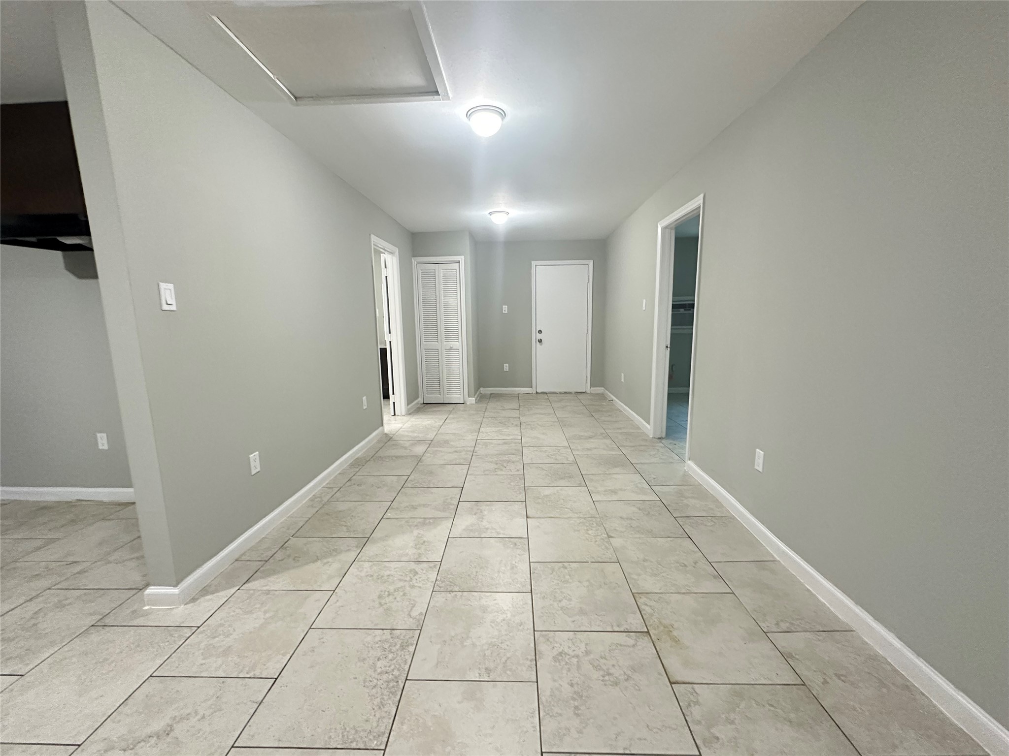 107 Altic Street, Unit 3 Houston, TX 77011 - Photo 7 of 13 a view of hallway with a window and entryway