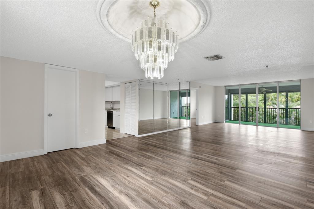 3940 Inverrary Boulevard, Unit 404 Fort Lauderdale, FL 33319 - Photo 2 of 36 Large Living Room/Dining Room Area