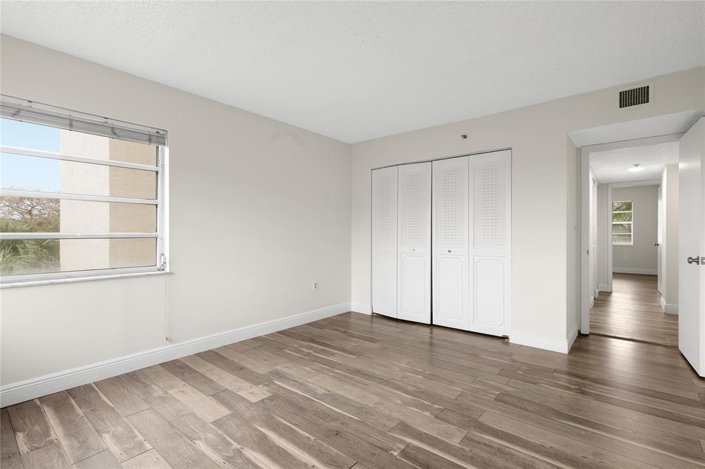 3940 Inverrary Boulevard, Unit 404 Fort Lauderdale, FL 33319 - Photo 21 of 36 1st Guest Bedroom
