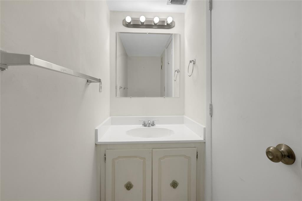 3940 Inverrary Boulevard, Unit 404 Fort Lauderdale, FL 33319 - Photo 25 of 36 Guest half-bath