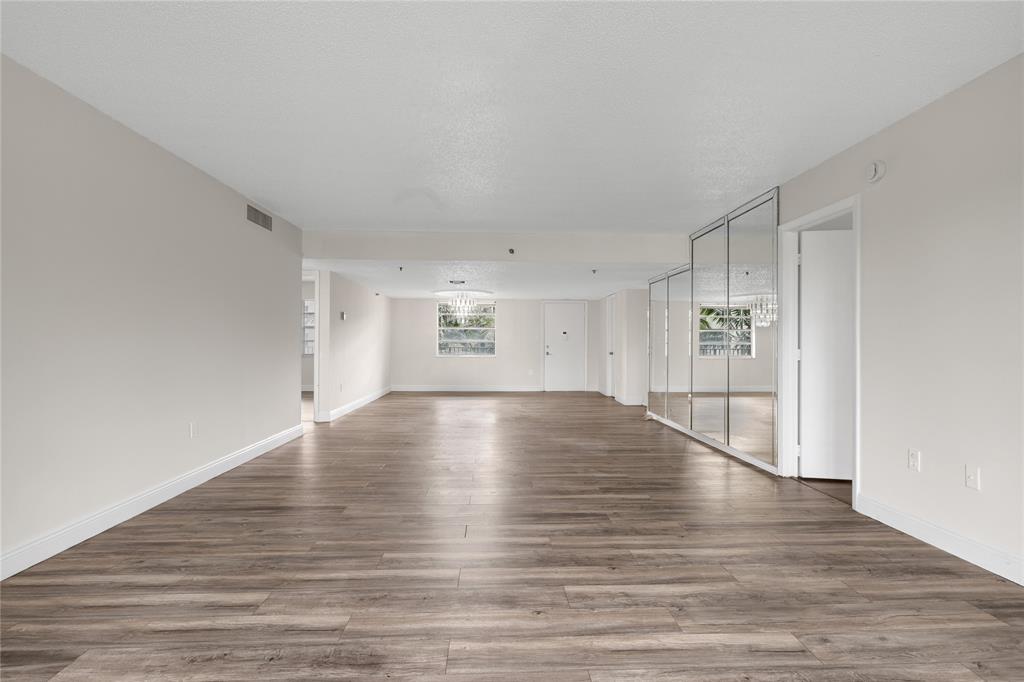 3940 Inverrary Boulevard, Unit 404 Fort Lauderdale, FL 33319 - Photo 7 of 36 Large Living Room/Dining Room Area